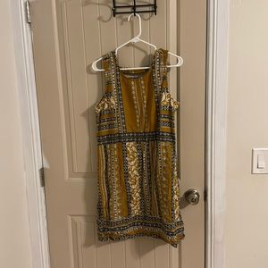 Short sleeveless dress mustard color